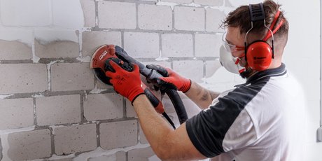Prepare masonry and apply ISOTEC sealing plaster
